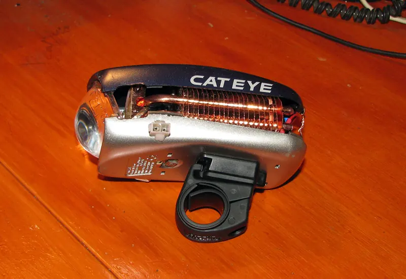 Custom cycle light with a copper heat-pipe cooler fitted into a modified silver Cateye housing