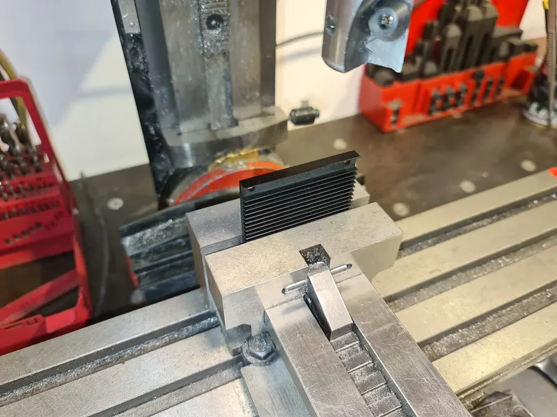 A UAV radio heat sink being machined in the workshop